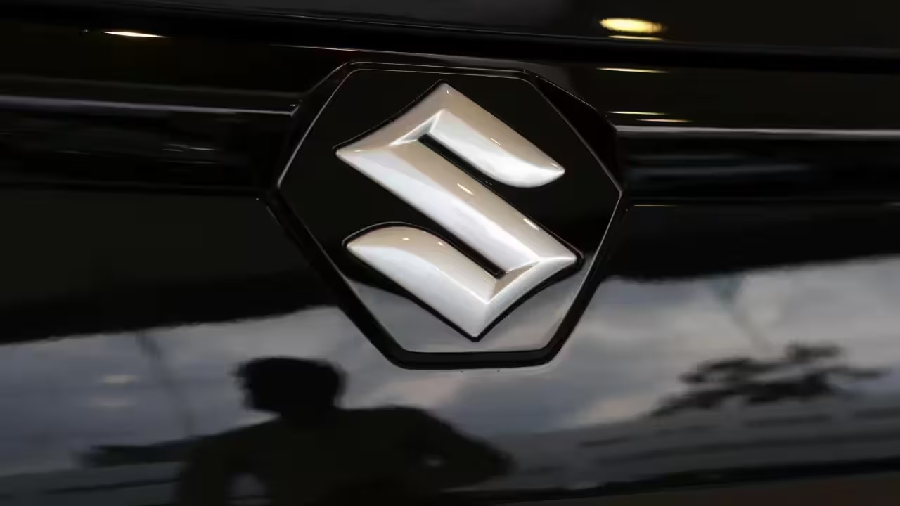Maruti MD Takeuchi states that smaller EVs will be introduced once the charging infrastructure is prepared. Featured Image